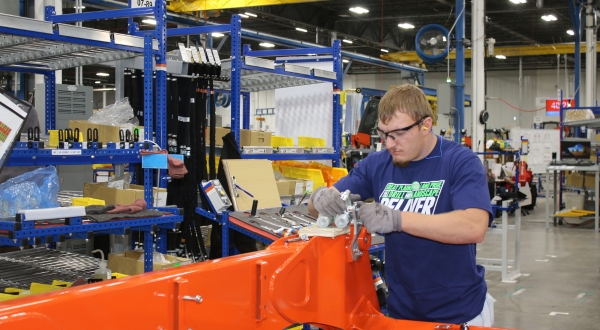 A K-State Salina student works at the Great Plains Manufacturing plant as apart of the Great Plains Manufacturing Scholars Program.