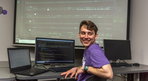 A K-State Salina students works on coding in class. 