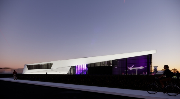 An image of the new on-campus K-AIRES building at K-State Salina with a beautiful Kansas sunset in the background.