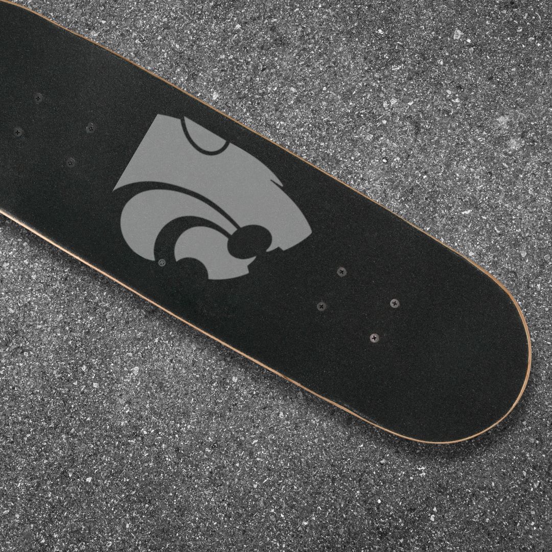 Skateboard with K-State Powercat on top