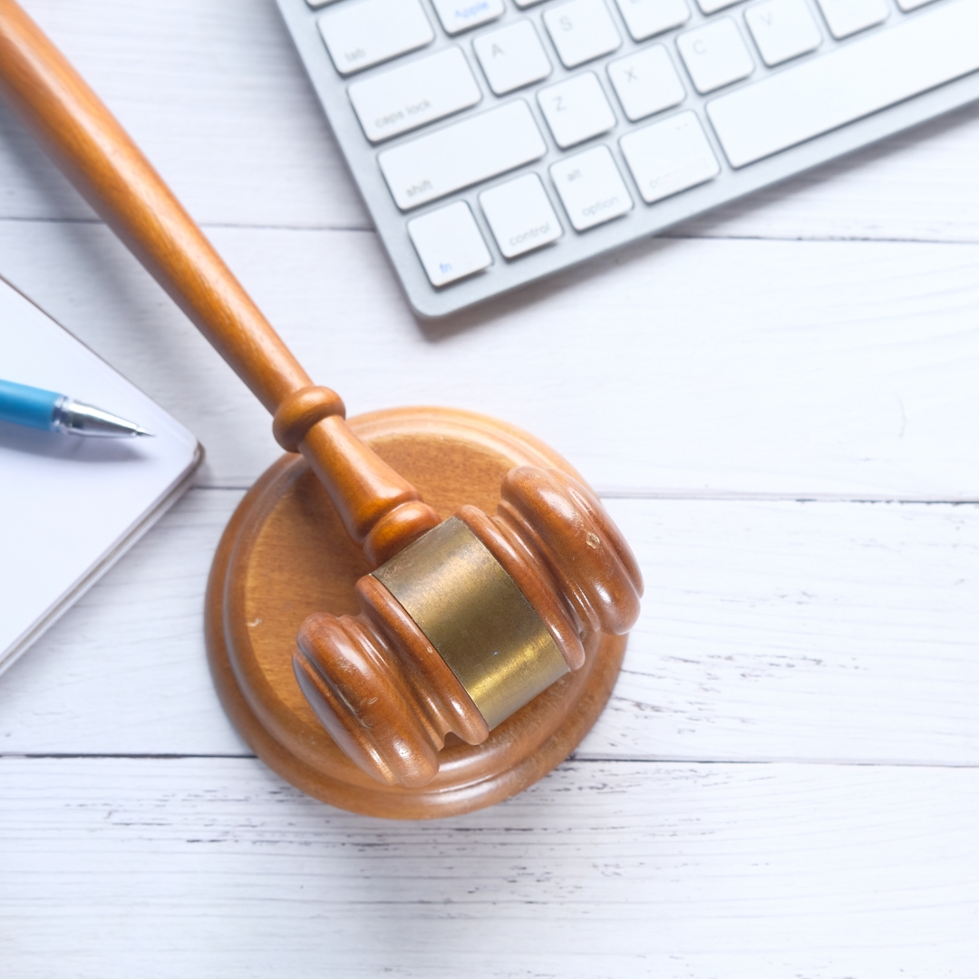 Gavel and papers on table